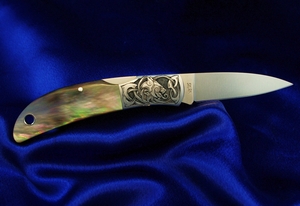 Celtic wolf , hand engraved pocket knife, mother of pearl handle